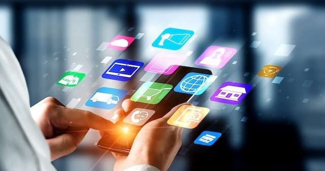 Person interacting with digital app icons on a smartphone screen