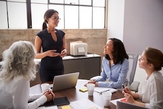 Woman leading a meeting